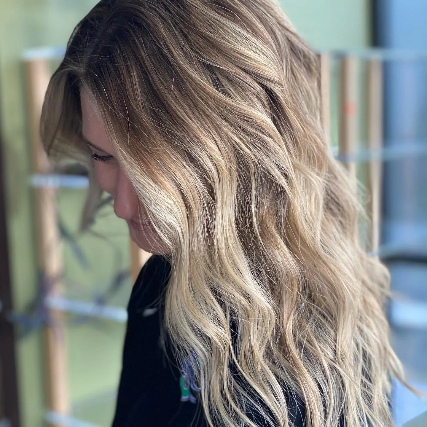 Platinum blonde lightening service with cool-toned gloss finish